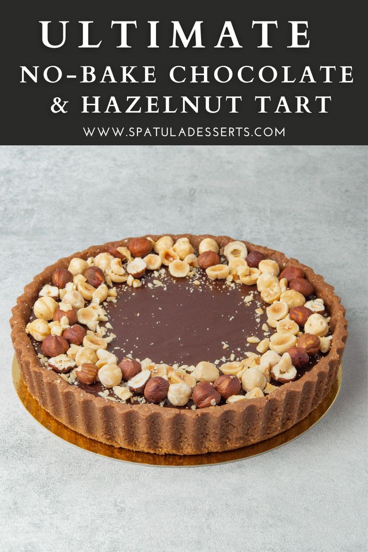 a chocolate tart with nuts on top and the words ultimate no - bake chocolate & hazelnut tart