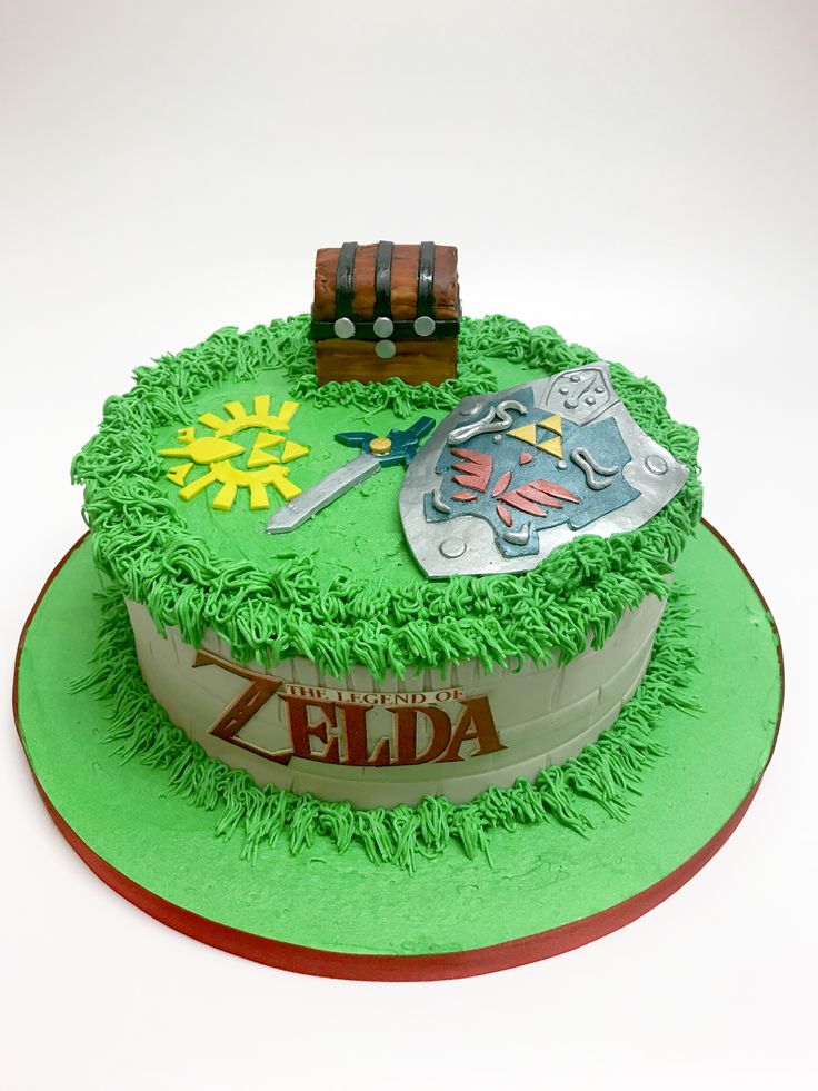 a zelda themed birthday cake on a green plate