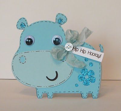 a blue hippogy with a name tag attached to it