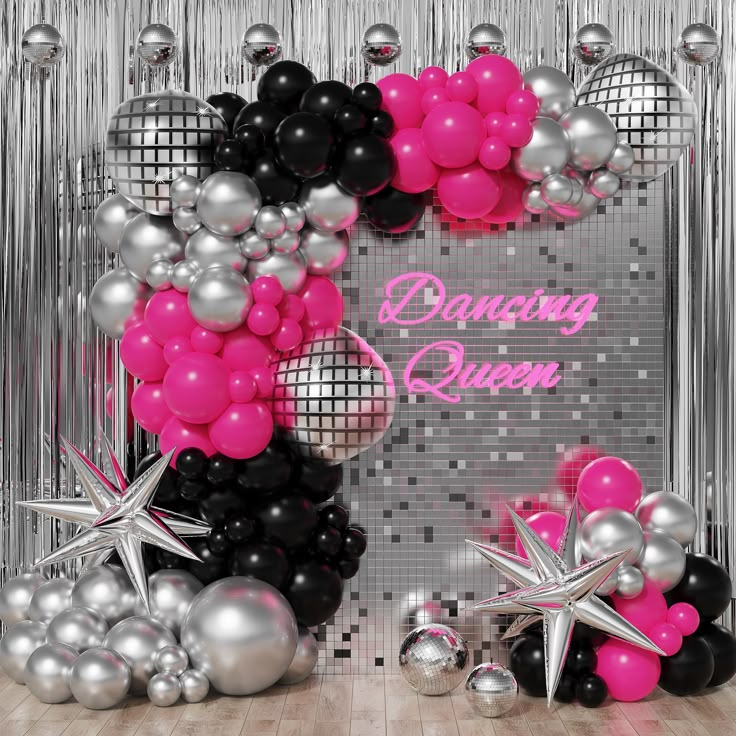 balloons and stars are on display in front of a silver backdrop with the words dancing queen