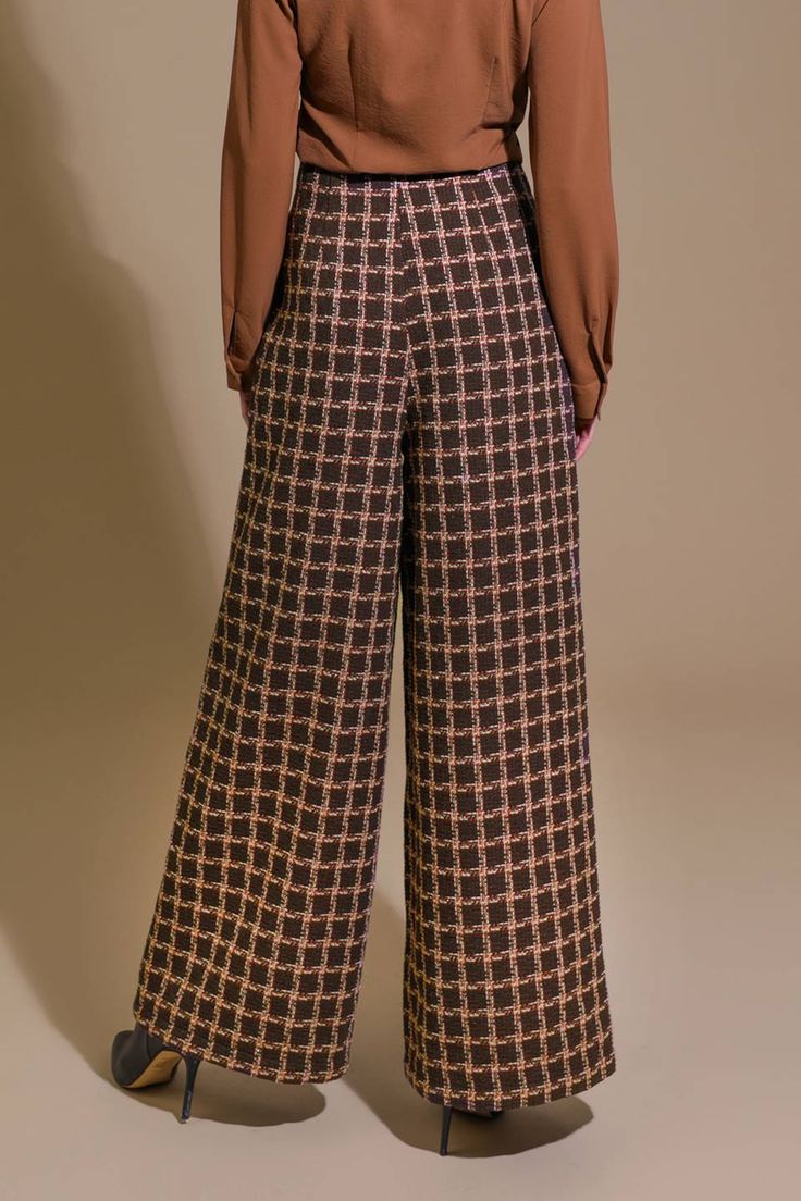 A tweed pant featuring side pockets with gold button detail and wide leg Details: Self : 100% PolyesterLining : 100% Polyester Size & Fit - Model is 5`8" And Wearing Size Small- Measurements Taken From Size Small- Approx. Length: 42" Inseam 29" Tweed Bottoms For Office In Fall, Brown Wide Leg Pants With Welt Pockets, Tweed Pants With Pockets For Fall, Fall Tweed Bottoms With Pockets, Tweed Bottoms With Pockets For Work, Tweed Bottoms For Workwear In Fall, Fall Tweed Bottoms For Work, Chic Tweed Pants For Workwear, Fall Tweed Trousers