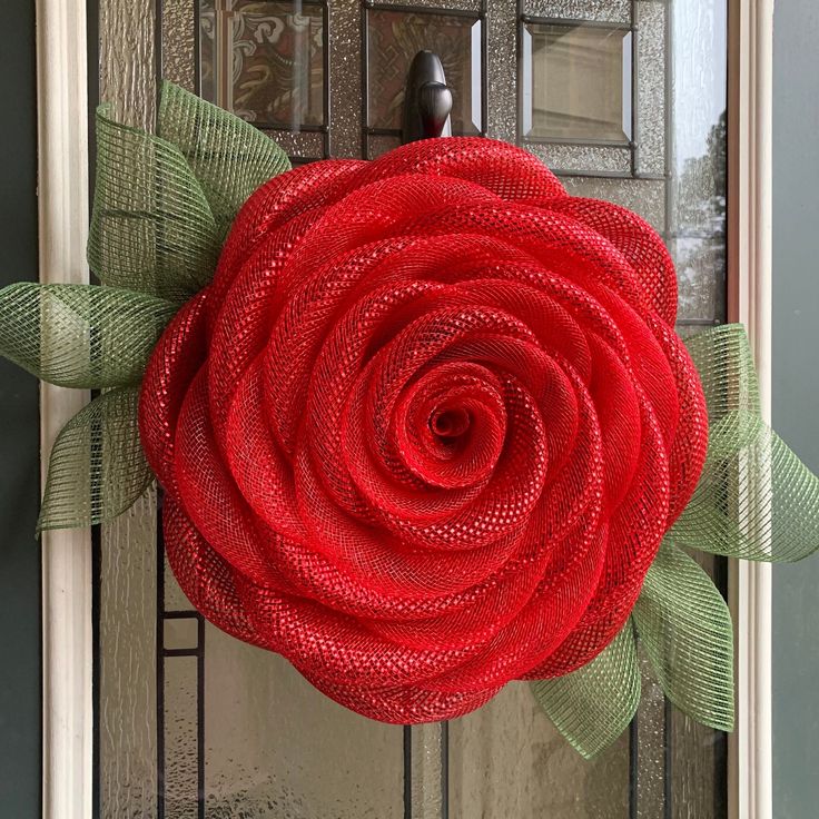 This large rose wreath in the color RED is ready to ship now! You can custom order different colors in this listing, they will take approximately 1-2 weeks (or send a message with your needed by date). It is hand made in alternating metallic and red mesh with green mesh leaves! Because it is made with deco mesh and a recycled plastic board, it holds up well when exposed to the environment. The rose wreath measures approximately 24"+ leaf to leaf, and 18"+ petal to petal. Please send me a message Red Rose Wreath, Hot Pink Roses, Country Door, Forever Rose, Diy Laundry, Christmas Tree Wreath, Rose Wreath, Patriotic Holidays, Room Storage