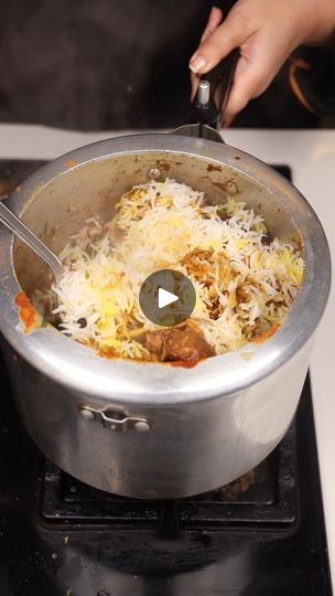 someone is cooking food in a pot on the stove