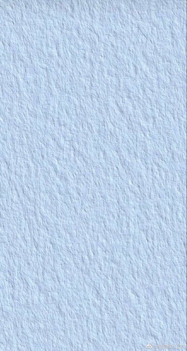 an image of a white paper textured with light blue paint on the bottom corner