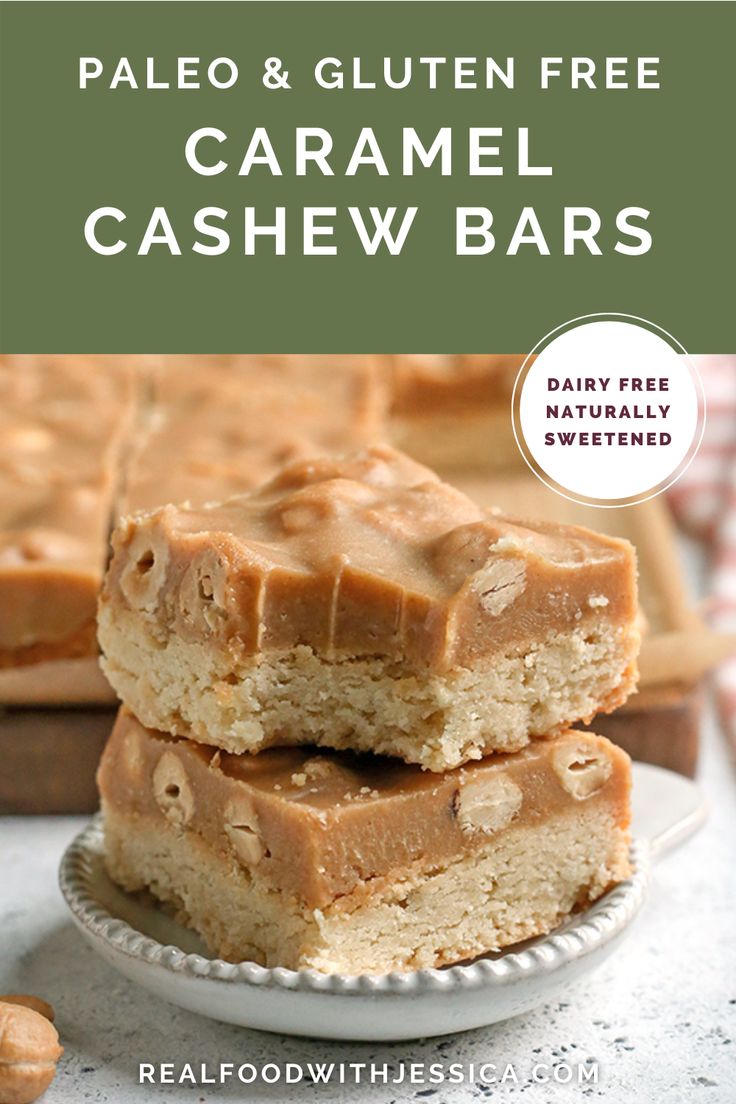 two pieces of caramel cashew bars stacked on top of each other in front of a plate