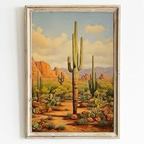 a painting on the wall of a desert with cacti and mountains in the background