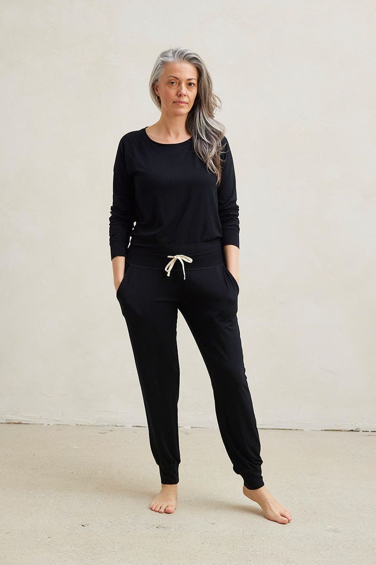 The Loungewear Set You've Been Dreaming Of. Combine the stylish and comfortable Harem Pants with the loose Relaxed Long Sleeve Top to create the loungewear set of your dreams! Made from our signature ultra-soft and moisture-wicking fabric blend. Includes a Relaxed Long Sleeve Top and Harem Pants. Made in Canada. Ultra-soft 93% Viscose from Bamboo / 7% Spandex. XS (0-2), S (0/2-4/6), M (6-8/10), L (10-12/14), XL (14-16/18), XXL (18-20/22). Machine washable & dryer friendly. Fabric patterns designed by and exclusive to This Is J. Black Relaxed Fit Sweatpants For Relaxation, Casual Black Sweatpants For Relaxation, Black Casual Sweatpants, Black Activewear For Lounging With Elastic Waistband, Black Activewear With Elastic Waistband For Lounging, Black Activewear For Lounging, Black Relaxed Fit Pants For Relaxation, Black Relaxed Fit Casual Pants, Black Relaxed Fit Joggers For Lounging