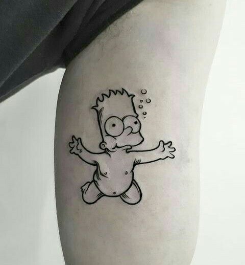 a person with a cartoon character tattoo on their arm and leg, in black ink