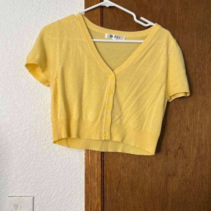 Never Been Worn, New Without Tags, Pale Yellow Cardigan. Perfect Condition, Great For Easter Trendy Short Sleeve Cardigan For Day Out, Trendy Short Sleeve Cotton Cardigan, Yellow V-neck Cardigan For Day Out, Fall Short Sleeve Cardigan For Day Out, Short Sleeve Cardigan For Fall Day Out, Cotton V-neck Cardigan For Day Out, Yellow Cardigan, Fashion Closet, Cropped Cardigan