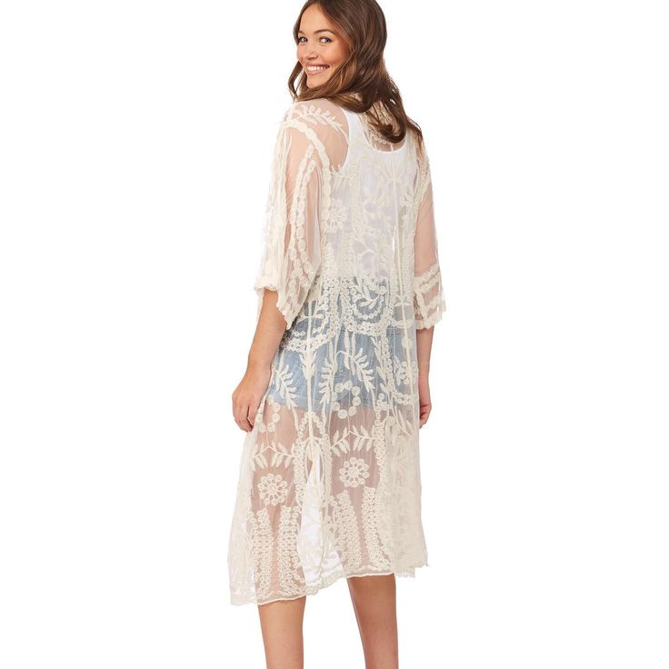 Crafted from semi sheer embroidered lace and cotton crochet, this knee-length kimono is perfect to wear as a cover up or dress up any outfit by wearing this over it. Semi-sheer embroidered lace nylon Cotton crochet accent One Size Fits Most Material: NYLON/COTTON Bohemian Lace Beach Cover-up, Spring Crochet Lace Beachwear Cover-up, Bohemian Lace Patchwork Summer Cover-up, Spring Festival Lace Cover-up, Crochet Lace Cover-up For Vacation, Sheer Lace Beachwear Cover-up, Lace Open Front Cover-up For Summer, Bohemian Lace Top For Beach In Spring, Crochet Lace Cover-up For Beach Season