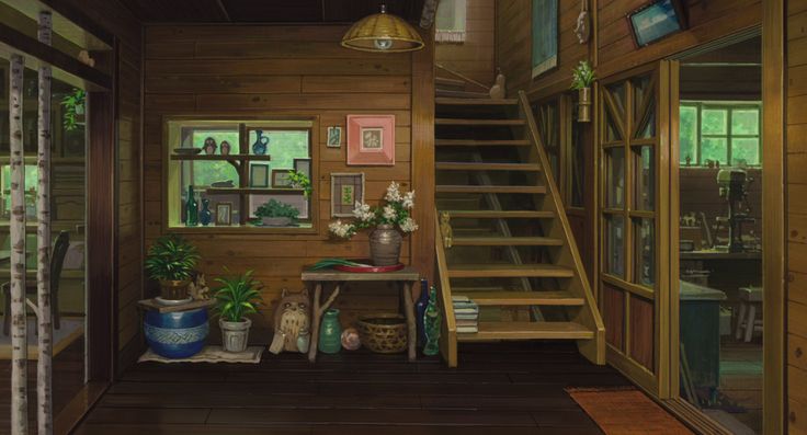 the interior of a cabin with stairs and potted plants