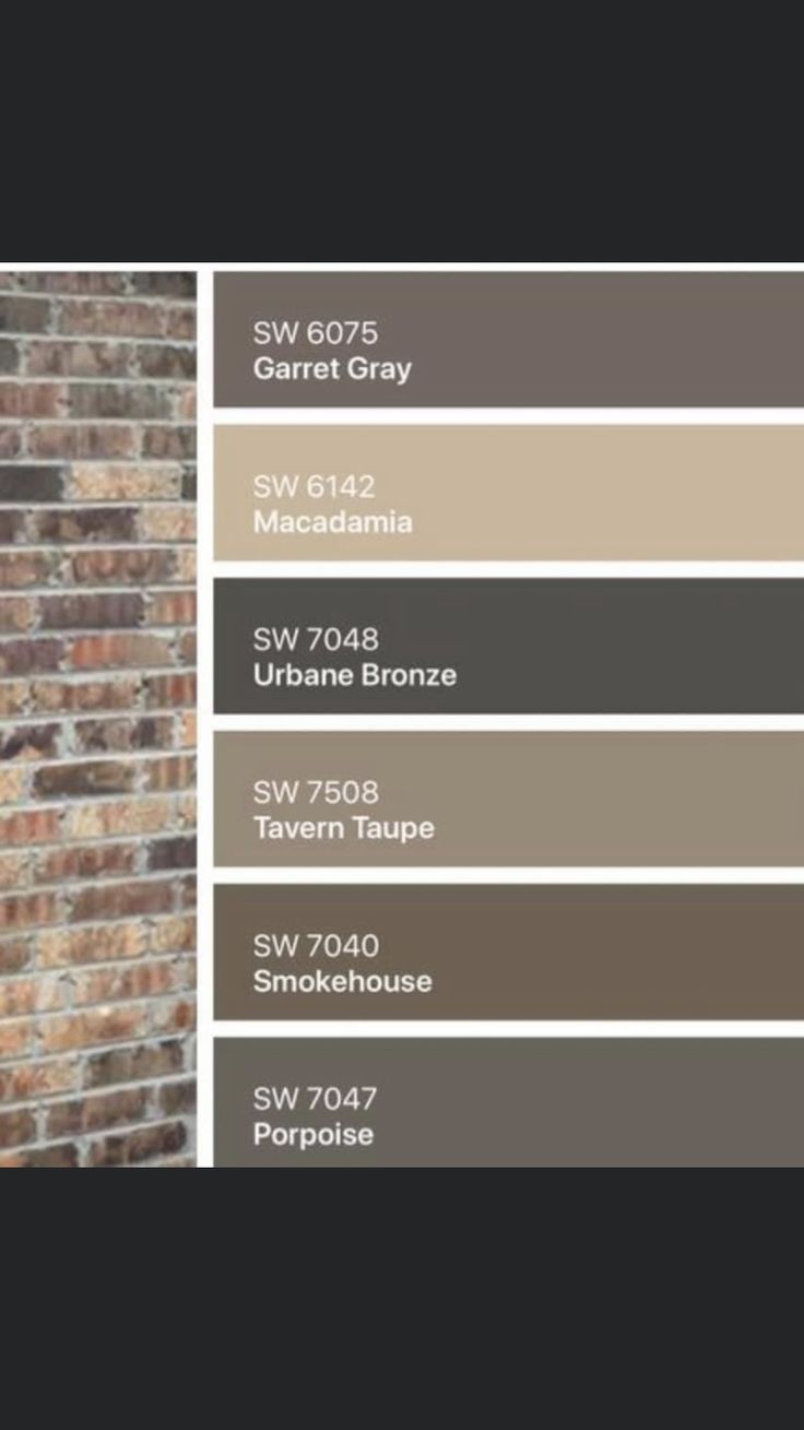 a brick wall with different shades of paint on it and the names of each color