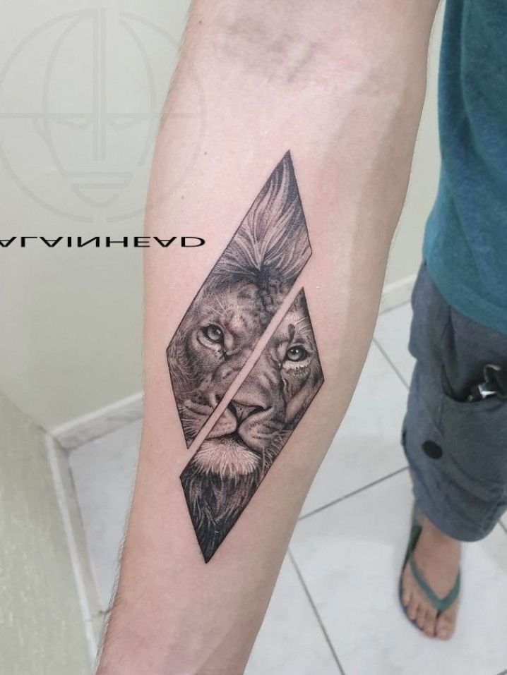 a man with a lion tattoo on his arm