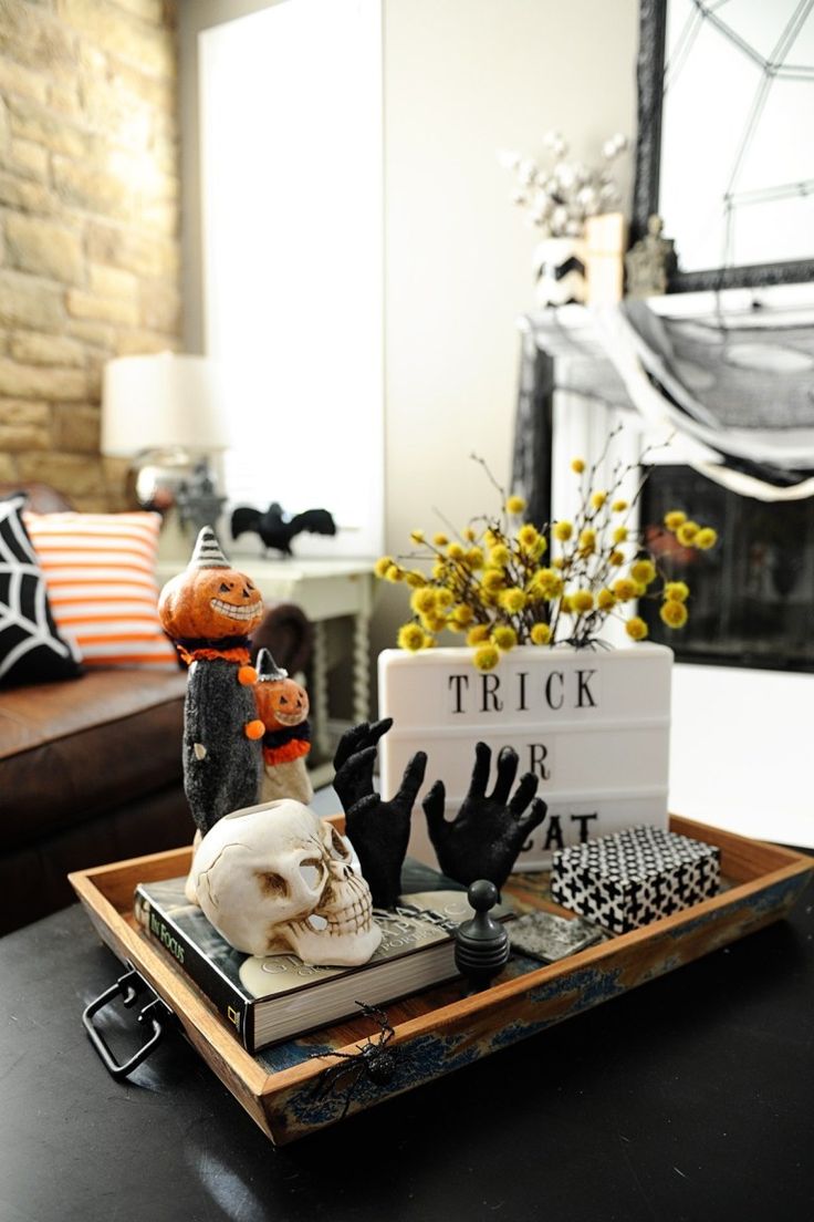 a tray that has halloween decorations on it