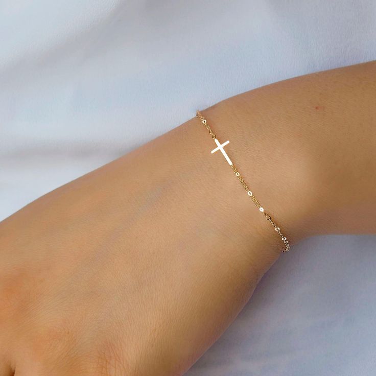 Cute and delicate Cross bracelet, available in sterling, gold, or rose gold.  Will be gift wrapped and ready for gifting.  Length is adjustable. Tiny Cross Bracelet - Mini Cross Bracelet, Confirmation gift for girl, Christmas gifts for her mom sister daughter, Birthday gifts, CR04BS Gold Charm Bracelet Gift, Adjustable 14k Gold Charm Bracelet Gift, Dainty Rose Gold Bracelets For Personalized Gift, Dainty Rose Gold Bracelet For Personalized Gift, Rose Gold 14k Gold-filled Bracelets As Gift, Custom Rose Gold Dainty Bracelet, Rose Gold 14k Gold-filled Bracelet Gift, Sterling Silver Name Bracelet For Gift, Delicate Adjustable Jewelry For Personalized Gifts