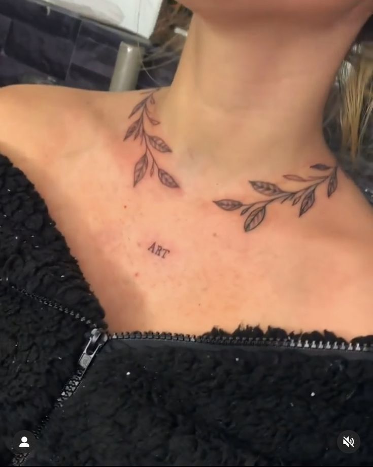 a woman with a tattoo on her chest