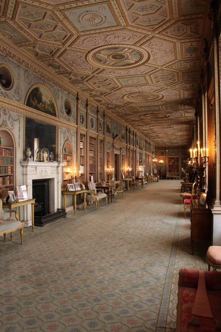 an ornately decorated room with chairs and tables