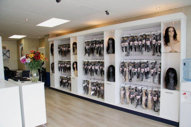 a large display case filled with lots of hair