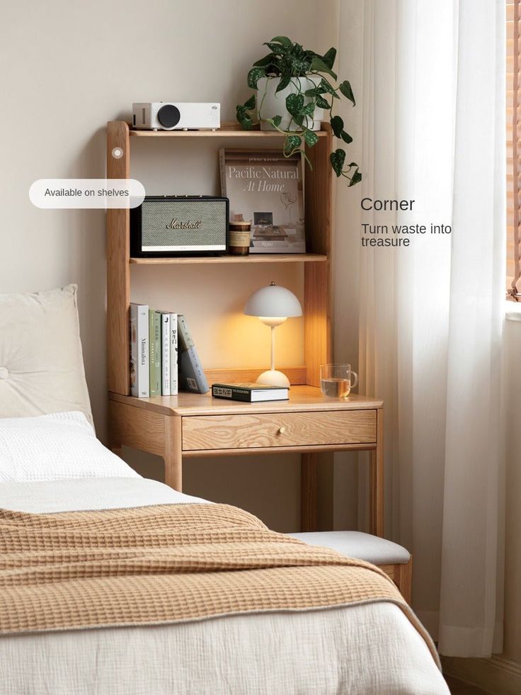 a bed room with a neatly made bed and a book shelf next to the window