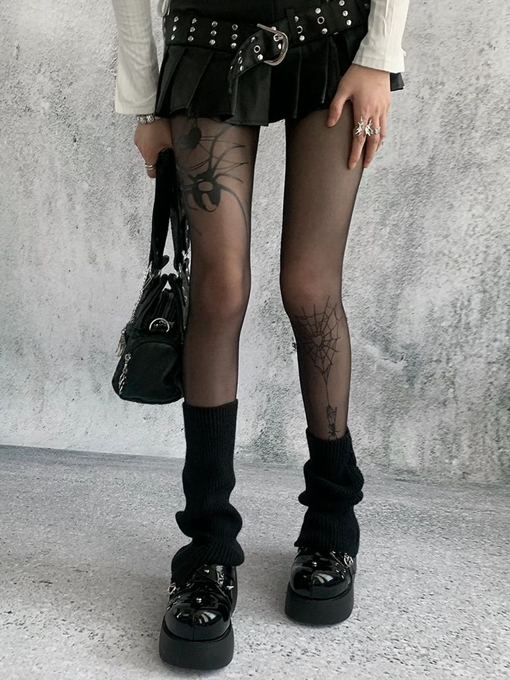 Elevate your fashion game with our spider print black summer asymmetrical tights. These unique tights feature a striking spider design that adds a touch of edgy sophistication to any outfit. Crafted from lightweight, breathable fabric, they are perfect for warm summer days and nights. The asymmetrical cut adds a modern twist, ensuring you stand out from the crowd. Punk Style Black Thigh High Legwear, Black Punk Legwear For Cosplay, Punk Style Thigh High Black Legwear, Black Gothic Legwear For Alternative Fashion, Trendy Black Legwear For Alternative Fashion, Edgy Fall Tights, Black Gothic Legwear For Cosplay, Edgy Tights For Fall, Black Stretch Tights For Summer