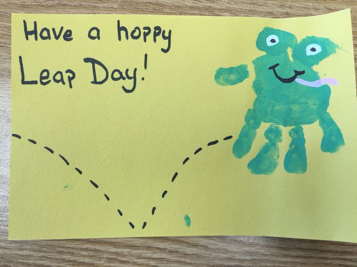 a child's handprint on a piece of paper that says, have a hoppy leap day