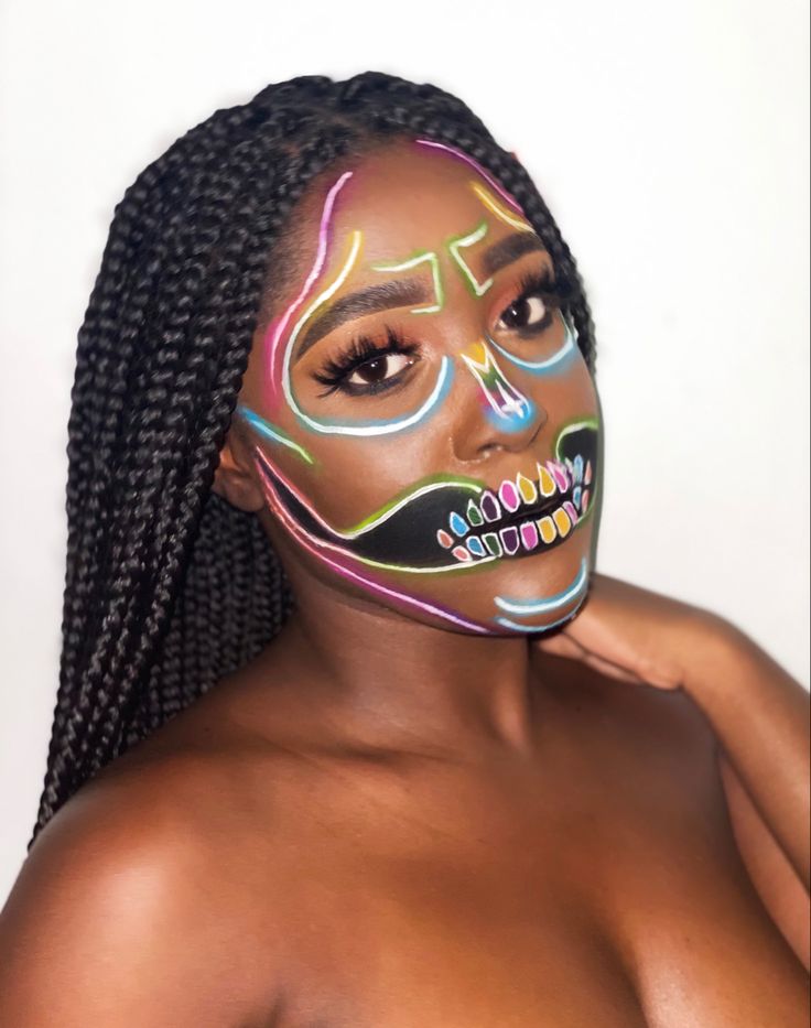 Colorful light up neon skeletal makeup Colourful Skull Makeup, Girls Skeleton Makeup, Girl Skeleton Makeup, Neon Skeleton Makeup, Neon Skull Makeup, Neon Skeleton, Neon Skull, Simple Skull, Skeleton Makeup