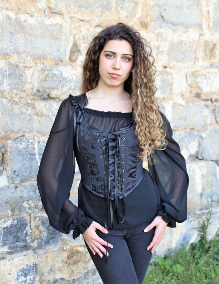 Renaissance corset bodice stays from Haizea Couture Black cottage core peasant bodice great for dark academia or goth fairy larp costume! This overbust corset top with straps is made of black brocade fabric with. It has 16 spiral and sprung steel bones and satin lacing at front with modesty panel with two bones. SIZE CHART Ideally suited for someone with the following measurements: Size XS Bust: 82cm-90cm / 32''-36'' Waist: 64cm-72cm / 25''-28'' Size S Bust: 87cm-95cm / 34''-38'' Waist: 69cm-77c Witch Corset, Peasant Bodice, Black Fairy, Blouse Elegant, Larp Costume, Overbust Corset, Womens Costumes, Corset Bodice, Black Chiffon