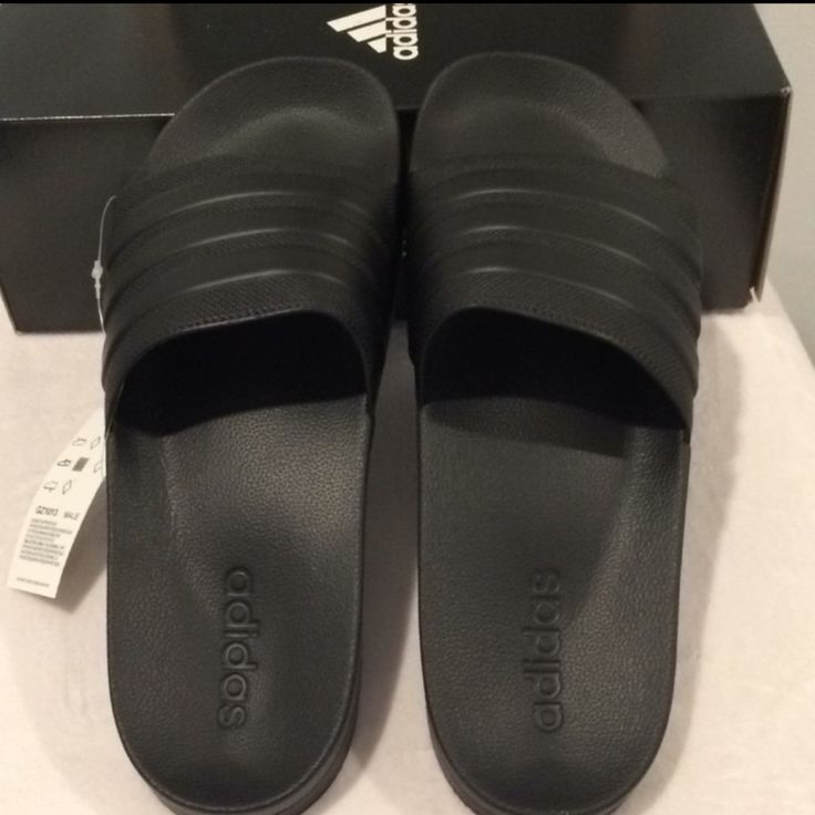 Adidas -Style Name: Adilette Shower -Description:. Unisex Slip-On Sandal/ Shower Slippers/Shoes -Color: Black/Black/Black -Size: Mens 13 /Women's 14 The Picture Has A Tag With A Tag With Size 11 On It, That Is Just Another Size That's Not This Pair. These Are Indeed 13 Mens And 14 Women's -Condition: New With Box Slip-resistant Black Sandals, Adidas Non-slip Black Slides, Adidas Black Non-slip Slides, Adidas Black Sport Sandals For Summer, Adidas Black Synthetic Sport Sandals, Black Slip-resistant Flat Sandals, Adidas Black Slip-on Slides, Black Slip-resistant Sandals Made Of Tpr, Black Slip-resistant Sandals