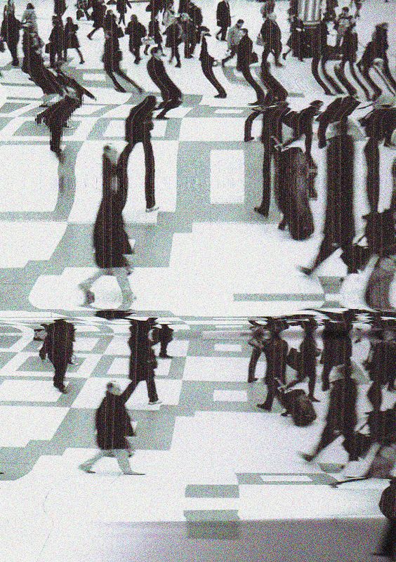 a group of people walking across a tiled floor