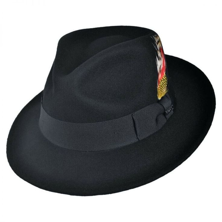 Please Note: Sizes M and L run large S = Fits true to size  M = Runs 1/2 size too large  L = Runs 1/2 size too large  XL = Fits true to size  XXL = Fits true to size Timeless. Classic. The C-Crown Crushable Fedora Hat by Jaxon Hats encompasses both those words and more. Made of 100% wool felt, the C-Crown Crushable Fedora Hat touts a teardrop crown (aka "C-Crown"), a grosgrain ribbon hatband with side bow, feather and Jaxon hat pin as well as a classic snap brim. Its malleable wool felt construction gives the C-Crown Crushable Fedora Hat its crushable/packable ability in addition to its natural water resistance.  Dressy AND practical, the C-Crown Crushable Fedora Hat by Jaxon Hats is the perfect marriage of quality and craftsmanship at a price only Jaxon Hats can offer.  Approx. 4" Crown 2 Casual Fitted Winter Hat Band, Classic Black Fedora One Size Fits Most, Classic Black Fedora One Size, Classic Black Fedora (one Size Fits Most), Casual Fitted Wide Brim Felt Hat, Casual Fitted Felt Hat For Winter, Casual Fitted Felt Hat With Short Brim, Black Flat Bill Fedora For Summer, Fitted Casual Fedora With Short Brim