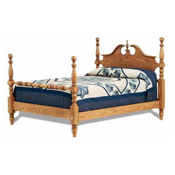 a wooden bed frame with blue and white bedspread on top of the mattress