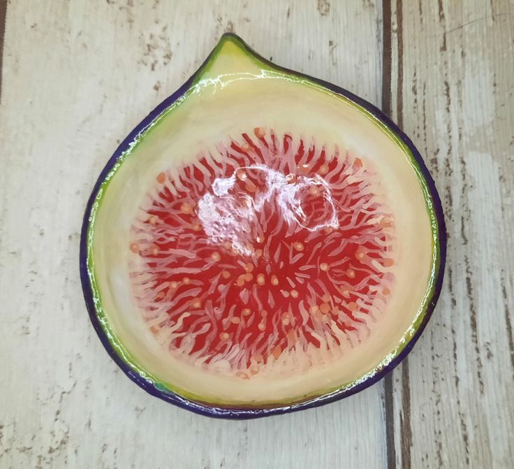 a close up of a piece of fruit on a table