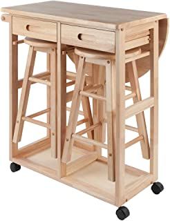 a kitchen island with two stools on wheels and one drawer open to the side