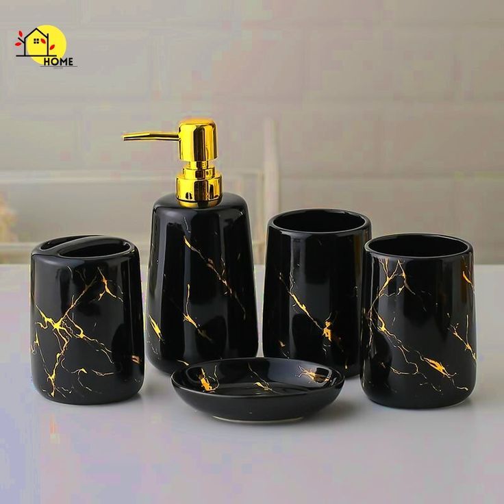 black marble bathroom accessories set with gold accents