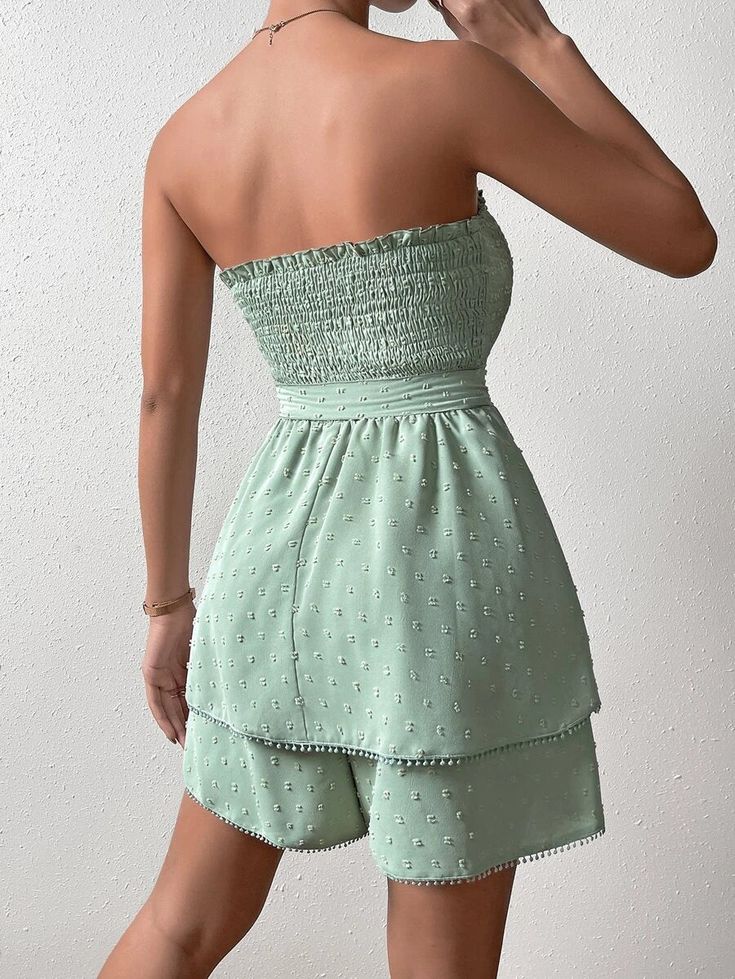 Show off your style in this Trim Shirred Belted Tube Romper. This romper features a strapless neckline, sleeveless design, and high-waisted fit for an ultra-flattering look. The mint green color is complemented by the contrast lace, frill, and shirred details for added charm. It is crafted from lightweight woven fabric with a slight stretch that allows you to move comfortably at all times. Plus, it comes with a matching belt to add definition to your waistline. Perfect for any special event or party, this romper will make sure you look stylish yet feel comfortable all night long! Features: Color: Mint Green Pattern Type: Plain Details: Belted, Contrast Lace, Frill, Shirred Length: Short Type: Tube Fit Type: Regular Fit Neckline: Strapless Sleeve Length: Sleeveless Waist Line: High Waist Fa Tube Romper, Comfy Jumpsuits, Mint Green Color, Strapless Neckline, Green Pattern, Special Event, No Frills, Green Color, Mint Green