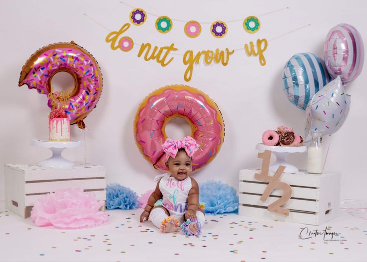 Donut themed half birthday shoot Donut Grow Up Half Birthday, Half Way To One Donut Photoshoot, Donut Grow Up Photoshoot 6 Months, Half Dozen Donut Photoshoot, Half Way To One Donut Theme, Donut Half Birthday Pictures, Donut Baby Photoshoot, Girl Half Birthday Ideas, 6 Month Baby Party Half Birthday