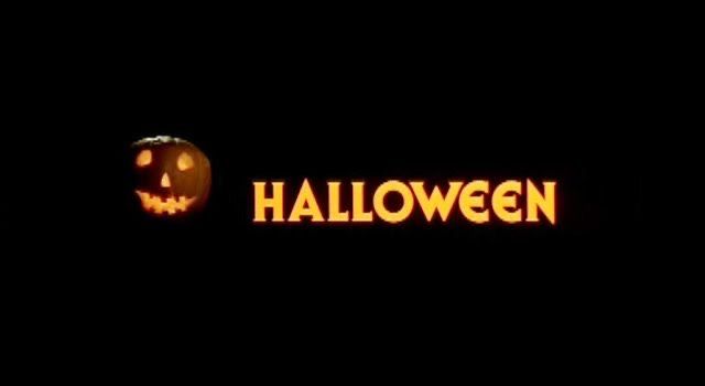 an animated pumpkin with the word halloween carved into it's face and glowing in the dark