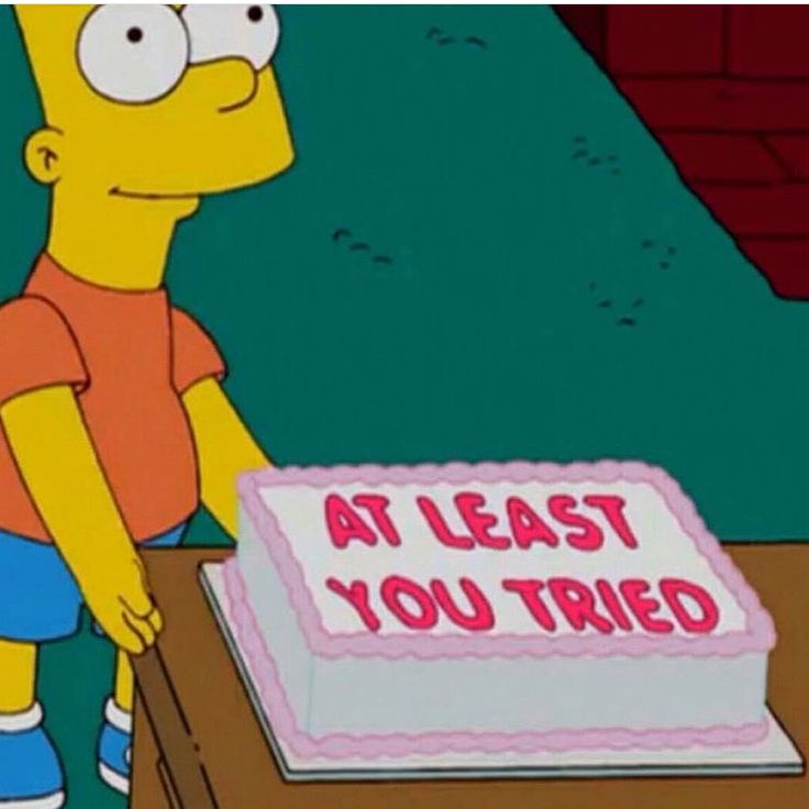 a person standing in front of a cake with the words at least you tried