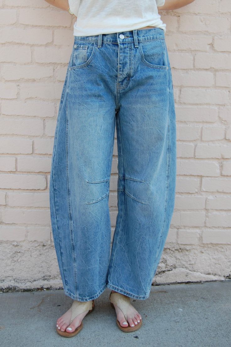 Bellamy Barrel Jeans in Denim ♡ Product Highlights ♡ These Bellamy Barrel Jeans in Denim are the perfect stylish staple piece to add to your closet, and or any on-trend bohemian style outfit! Featuring a 5 pocket styling, a lined knee and side leg detail and a medium wash denim blue color, this jean is perfect for any boho look! ✁ Contents & Measurements ✁ These Bellamy Barrel Jeans in Denim's contents contain 100% Cotton material. • 5 pocket styling • Button & zipper fly closure • Total body le Spring Denim Cargo Jeans For Everyday, Spring Everyday Denim Cargo Jeans, Trendy Medium Wash Cargo Jeans With Frayed Hem, Spring Denim Blue Cargo Jeans For Everyday Wear, Spring Denim Cargo Jeans, Baggy Straight Leg Bohemian Jeans, Baggy Bohemian Straight Leg Jeans, Bohemian Baggy Straight Leg Jeans, Spring High Waist Bohemian Jeans