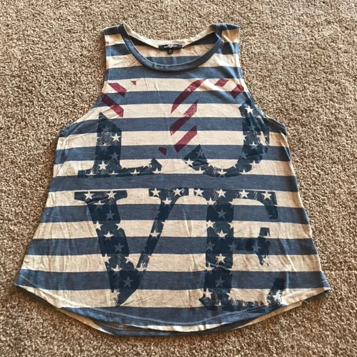 This Ransom Tank Top Is Size Medium. This Is Brand New But The Tags Were Removed. It Would Be Perfect For The 4th Of July. American Flag Print Cotton Top For Beach, Casual Tops For 4th Of July Vacation, Casual Tops For Vacation And 4th Of July, Casual American Flag Print Top For Vacation, Patriotic Cotton Tops For Vacation, Trendy Sleeveless Top For 4th Of July, Spring Casual Tank Top With American Flag Print, Casual American Flag Print Tank Top For Spring, Patriotic Sleeveless Tops For Spring