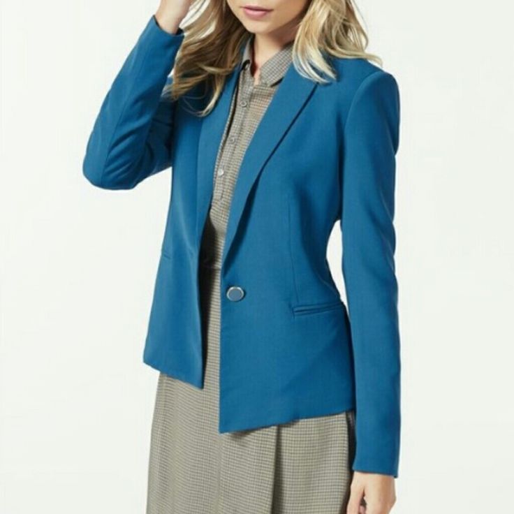 Beautiful Blue Blazer, Brand New With Tags! Super Cute And Flattering Modern Cut. Button In Front. Fabric Doesn't Wrinkle Easily. I Literally Just Bought It Myself And Love It, Plus It's Such A Pretty Colour, But It's Too Big For Me. Use It To Add A Pop Of Colour To Your Work Wardrobe, Or Pair With Jeans And Heels For A Cute Casual Outfit! Only Took It Out Of The Plastic To Try It On. From A Clean, Smoke-Free Home. Has Been Wrapped In Packaging In Storage. Blue Single Button Blazer For Fall, Blue Single Button Outerwear For Office, Blue Single-button Blazer For Work, Blue Single Button Blazer For Workwear, Blue Button-up Office Outerwear, Fall Blue Blazer For Office Wear, Blue Blazer With Buttons, Blue Blazer For Office Wear In Fall, Blue Single Button Outerwear