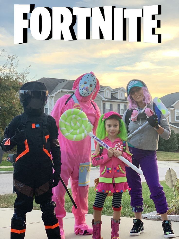 three children in costumes standing on the sidewalk with text overlay that reads fortnite