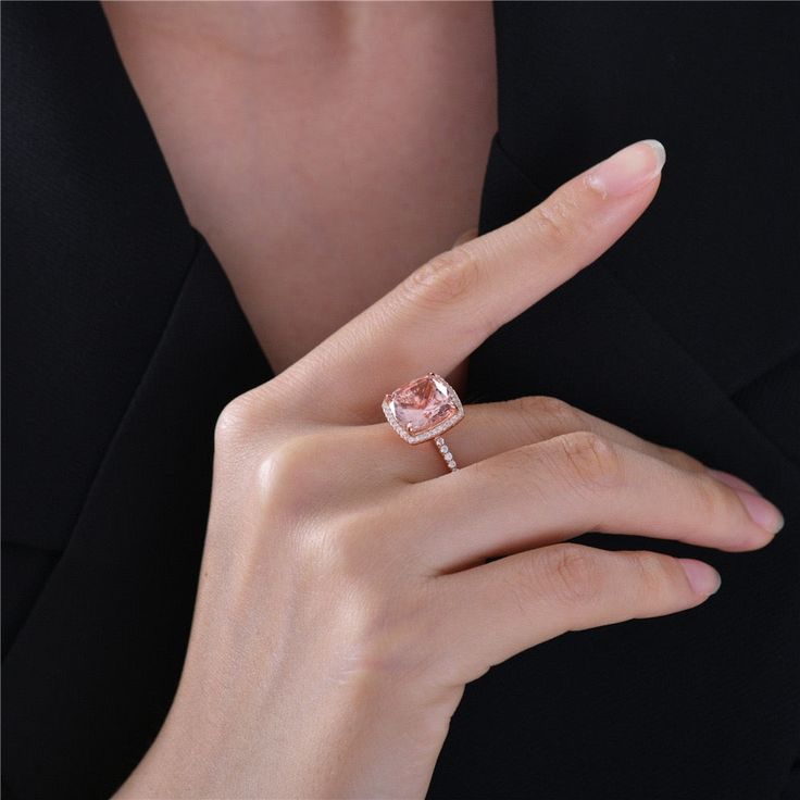 For just one small piece of jewelry, this Morgan ring packs a lot of incredible detail. The rose gold-tone plated setting is the perfect base for a square of pink stone. The rosa gemstone is gracefully held in place and adorned with little sparkling white zirconia, to deliver a gorgeous overall colorway. Handcrafted premium-grade square-cut 5A high carbon cubic zirconia gemstone 925 Sterling Silver - Hypoallergenic and durable 5-Carat Gemstone Weight: 2.9 g Stone Size: 10*10 mm Elegant Rose Gold Diamond Ring With Accent Stones, Formal Rose Gold Topaz Ring With Diamond Accents, Formal Rose Gold Morganite Diamond Ring, Luxury Rose Gold Morganite Diamond Ring, Elegant Rose Gold Topaz Ring With Diamond Accents, Elegant Rose Gold Topaz Ring With Accent Stones, Elegant Pink Diamond Ring For Proposal, Luxury Rose Gold Morganite Rings, Rose Gold Rings With Diamond Accents And Morganite