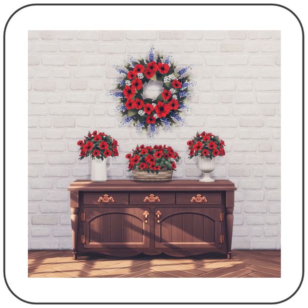 a table with flowers on it in front of a wreath and two vases filled with red, white and blue flowers