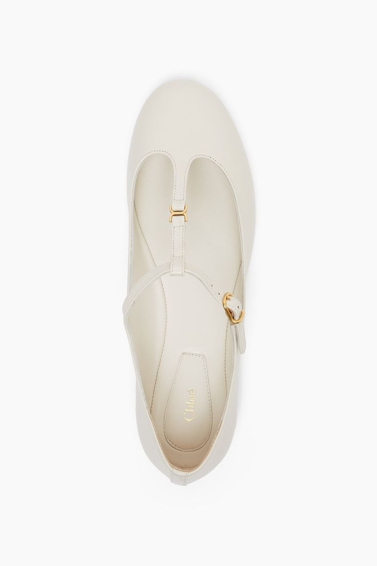 White leather ballet flats from Chloé. The Marcie ballet flats are made of nappa goatskin leather with an adjustable strap across the top detailed with Marcie's gold-tone-buckle in miniature, complete with an almond-shaped toe.Leather soleTrue to sizeMade in Italy Leather Ballet Flats, White Leather, Ballet Flats, Adjustable Straps, Chloe, Ballet, Gold Tones, Buckle, Off White