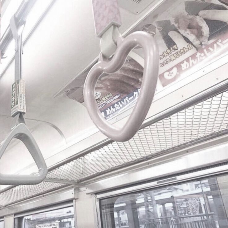 the interior of a subway train with no passengers