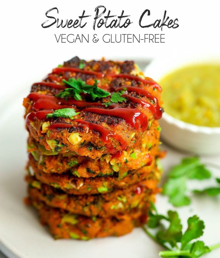 sweet potato cakes with vegan and gluten - free sauce on a white plate