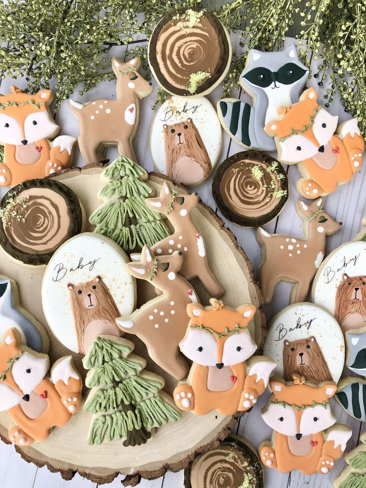 decorated cookies with woodland animals and trees