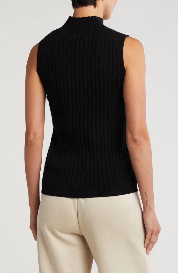 Classic rib knitting sweetens the style of a soft, lightweight sweater perfect for building cold-weather outfits. 24" length (size Medium) Mock neck Sleeveless 100% cashmere Dry clean Imported Solid Sleeveless Ribbed Top, Spring Turtleneck Knit Tank Top, Ribbed Vest For Fall, Knit Turtleneck Tank Top For Spring, Classic Sleeveless Sweater For Spring, Classic Sleeveless Spring Sweater, Casual Fine Knit Sweater Vest For Fall, Fitted Casual Sweater Vest For Layering, Casual Fitted Sweater Vest For Layering