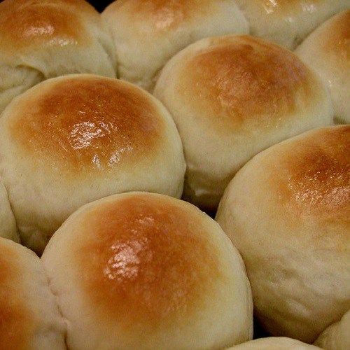 rolls are sitting in a baking pan ready to be baked